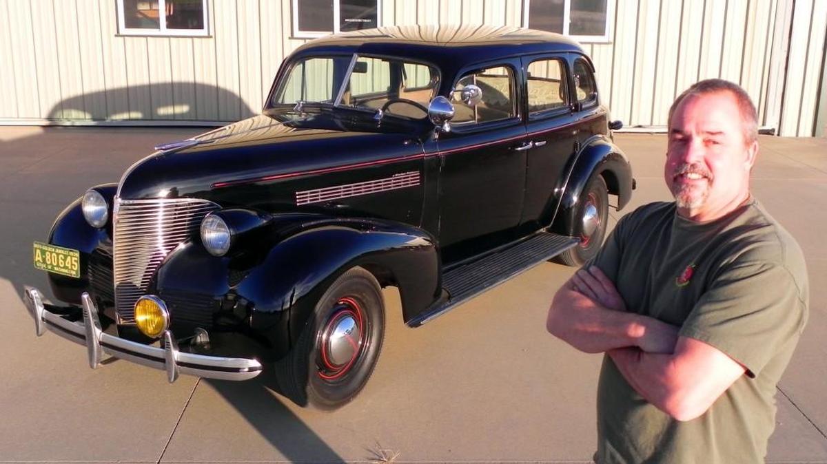 Eric Sorenson shows off the family sedan, a 68,000-mile survivor that his mother bought in Washington state. The 1939 Chevrolet Master Deluxe is now in his care, but Ramona Sorenson would like to be reunited with it in the future.