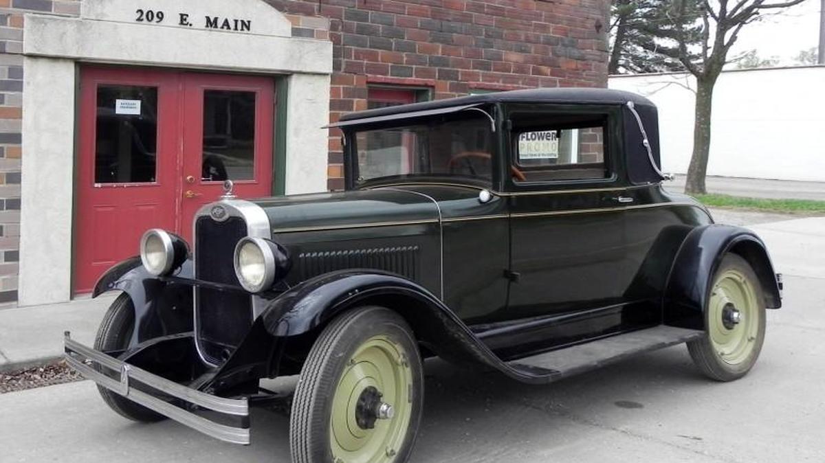 The car that should be the star of the Kansas Mennonite Relief Sale auction on April 8, a nearly pristine 1928 Chevrolet coupe with only 43,000 original miles on its odometer, parked in downtown Goessel. The old coupe, donated by Joyce Barkman of Hillsboro, will cross the auction block early in the afternoon at the Sunflower Building North at the Kansas State Fairgrounds in Hutchinson.