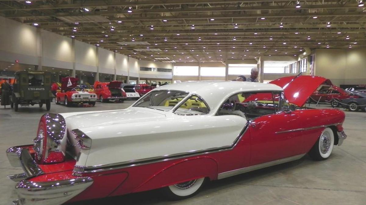 Thomas and Carol Murray brought their stunning 1957 Oldsmobile 88 custom up from Oklahoma City to take part in this year's Blacktop Nationals. Powered by a 371 cubic inch V8 with triple carbs and a 4-speed Hydramatic transmission, the red and white beauty took 14 years to restore/modify.