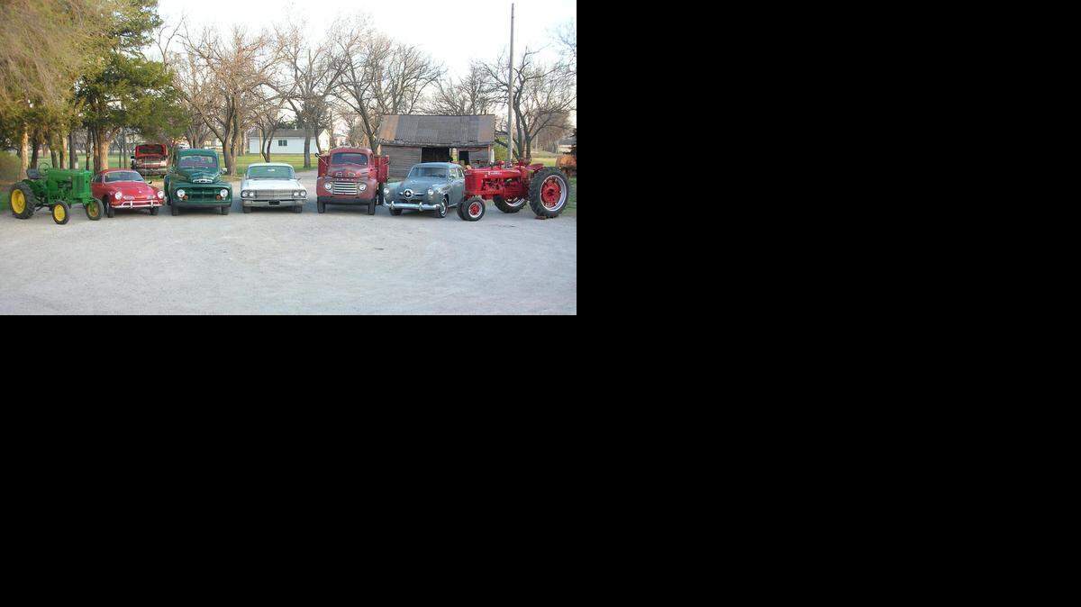 
This year's Kansas Mennonite Relief Sale will feature a total of seven donated machines: two tractors, two trucks and three automobiles. Left to right, they are a 1950 John Deere Model M, a 1970 Karman Ghia, a 1951 Ford F-1 pickup, a 1962 Cadillac 4-door hardtop, a 1948 Ford F-4 grain truck, a 1950 Studebaker Land Cruiser and a 1945 International Harvester Farmall H tractor.
