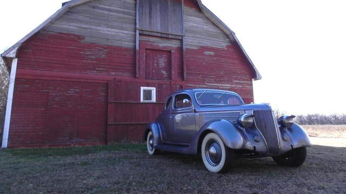 
Parked in the shade of a vintage barn of about the same age, the Wallis men's 1936 Ford coupe looks right at home. Three generations combined their time and talents to recreate grandfather Jimmie Wallis' first car. 

