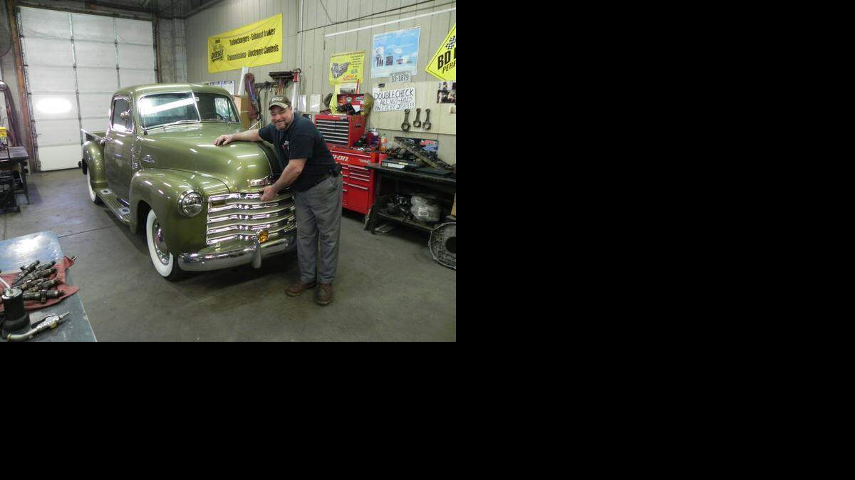 
Randy Miller gives ‘Blanche,’ his recently recovered 1953 Chevy pickup a hug, saying it was just about the best Christmas present he could have wished for. The truck was stolen Aug. 11 in Salina and was found, thanks to an anonymous tip, in Topeka, where it was about to be disposed of.
