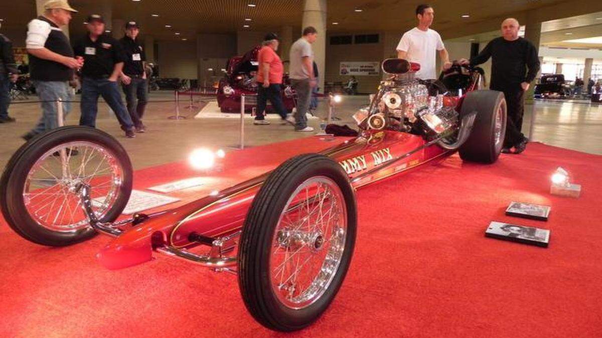 Corey Conyers, left, and Gary Cooper finished up John Neas' spectacular recreation of Jimmy Nix's AA/FD right here in Wichita just in time to debut it at the Starbird-Devlin show. Conyers replicated the original Kent Fuller chassis, built the body panels and painted the car, while Cooper built the blown, injected Hemi engine in the vintage dragster.   
