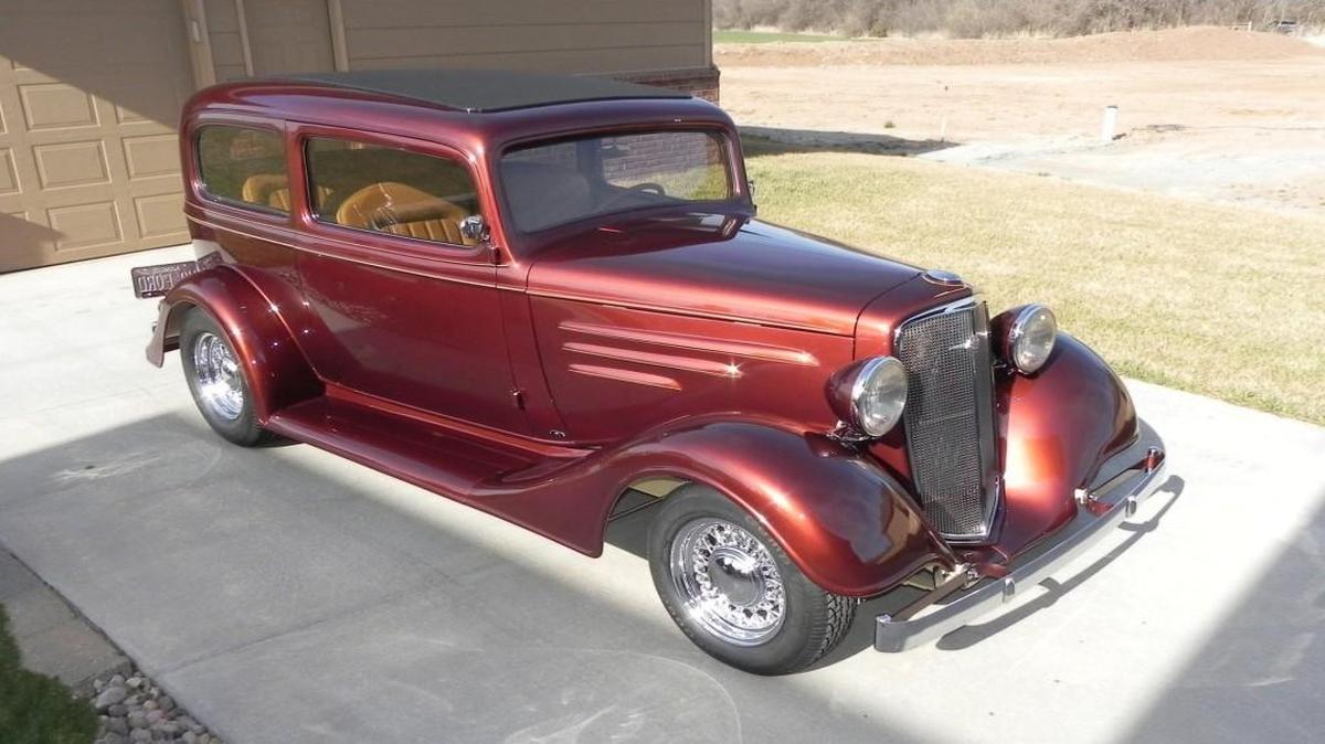 Twenty-five years in the making, Ron Moore’s 1935 Chevy sedan is a wire-wheeled Root Beer-colored beauty, with modern V-8 power, air conditioning and a sumptuous Italian leather interior. His objective was to keep the car’s original lines, resisting the urging of other street rodders to chop the car’s top. But there are plenty of subtle modifications if you look close enough.