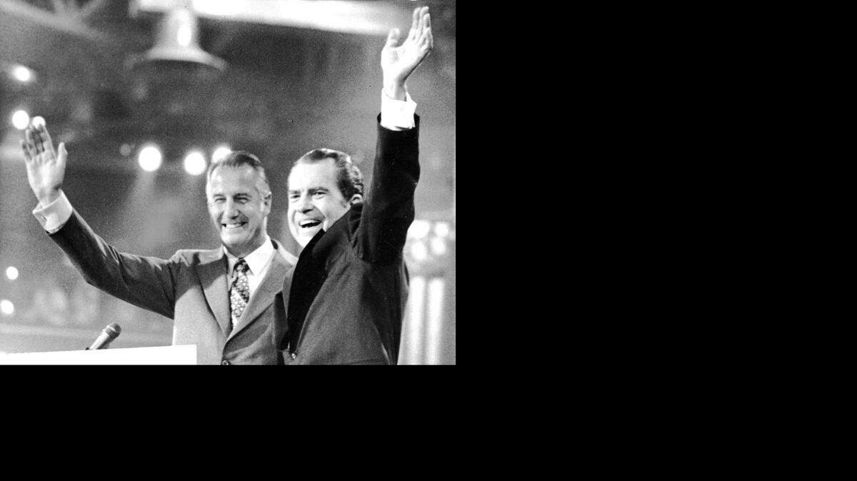 
President Richard Nixon and Vice President Spiro T. Agnew wave to delegates at the final session of the Republican National Convention in Miami Beach in 1972. On Oct. 10, 1973, Agnew, accused of accepting bribes, pleaded no contest to one count of federal income tax evasion and resigned his office.
