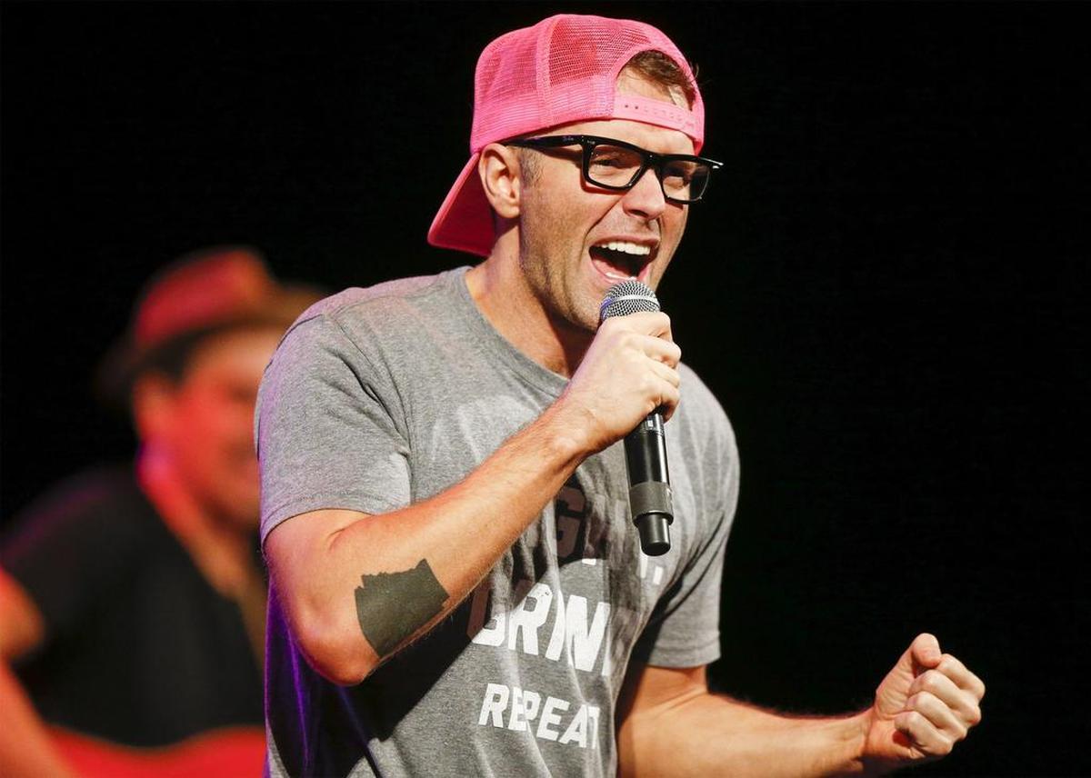 Nashville DJ Bobby Bones and his sidekick Eddie perform for the crowd at the Orpheum Theatre. The duo are known as the Raging Idiots. (Aug. 28, 2015)