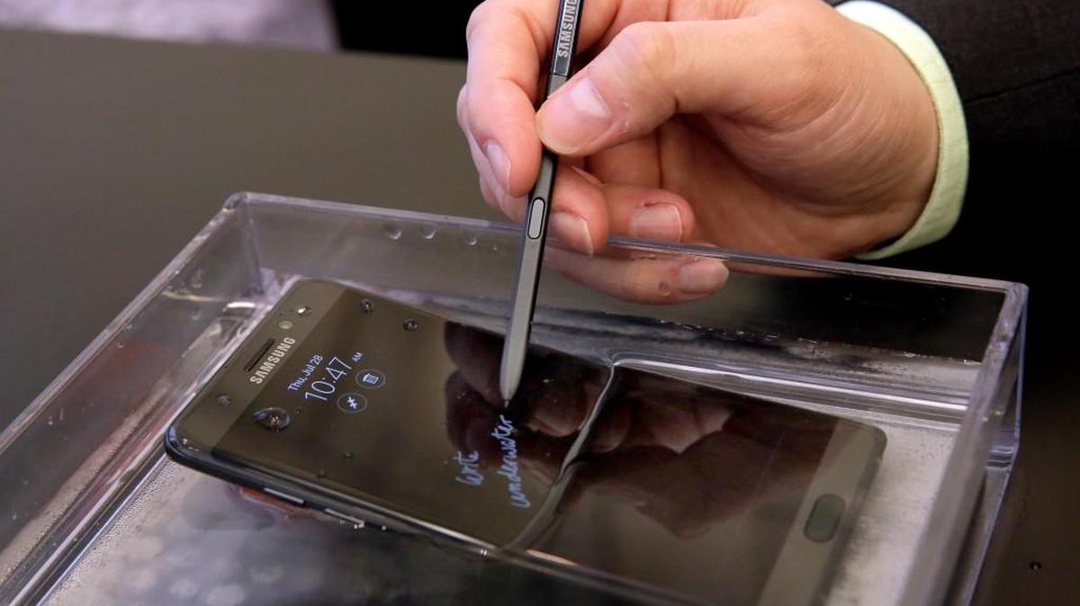 A submerged Galaxy Note 7 is demonstrated July 28 in New York. Samsung released an update to its jumbo smartphone and virtual-reality headset, mostly with enhancements rather than anything revolutionary, during a preview of Samsung products.