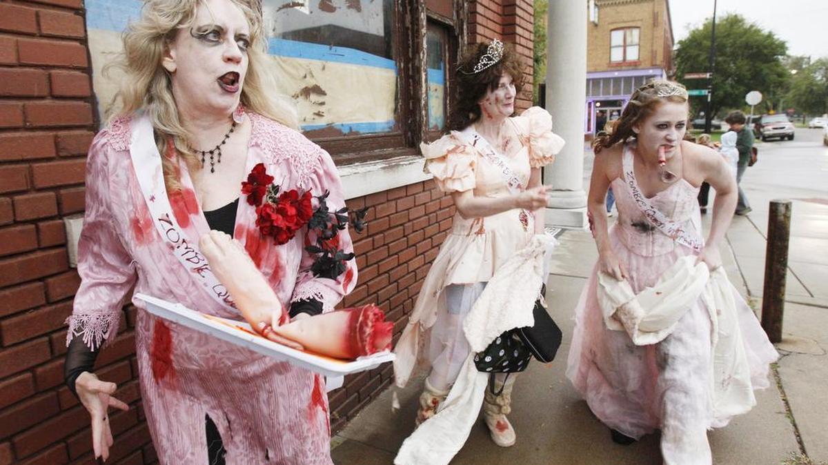 
Zombie queens Patricia Baab, left, Rachel Workman and Christina Rollins prowl the Delano district during the annual Ghost Stories of Historic Delano. (2009)
