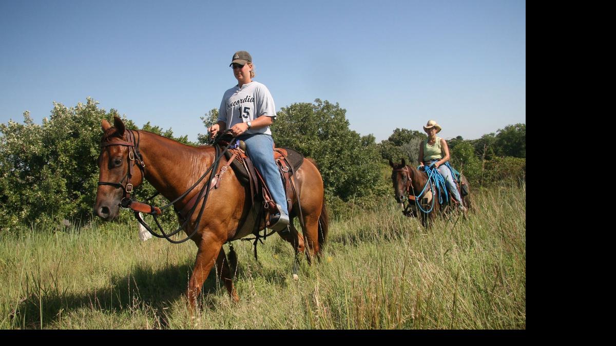 
Amity Bruns, Beaver Crossing, Neb., rides her horse, Zip, along one of Kanopolis State Park’s 26 miles of equestrian trails.
