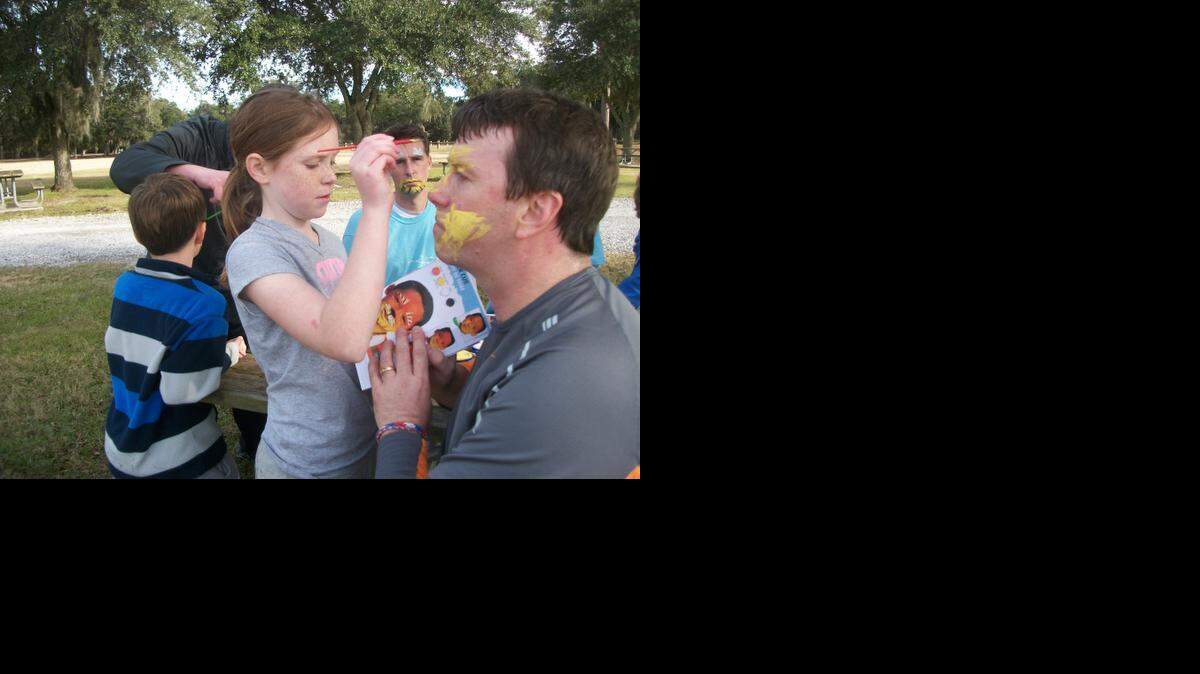 
Face painting using a guide is one potential challenge when teams compete in the “Great Amazing Race.”
