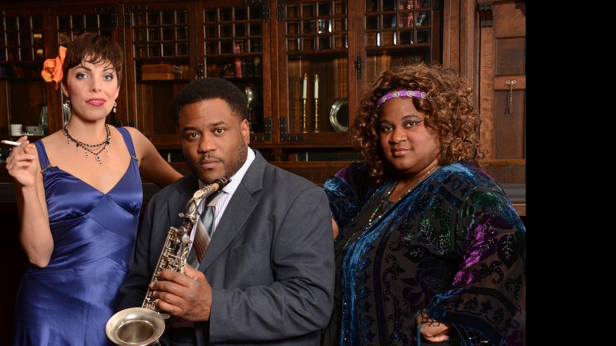 
Chelsey Moore, left, Kevin Harrison and Trisha Garnes star in the Forum Theatre’s “Blues in the Night” musical revue of 26 vintage blues standards.
