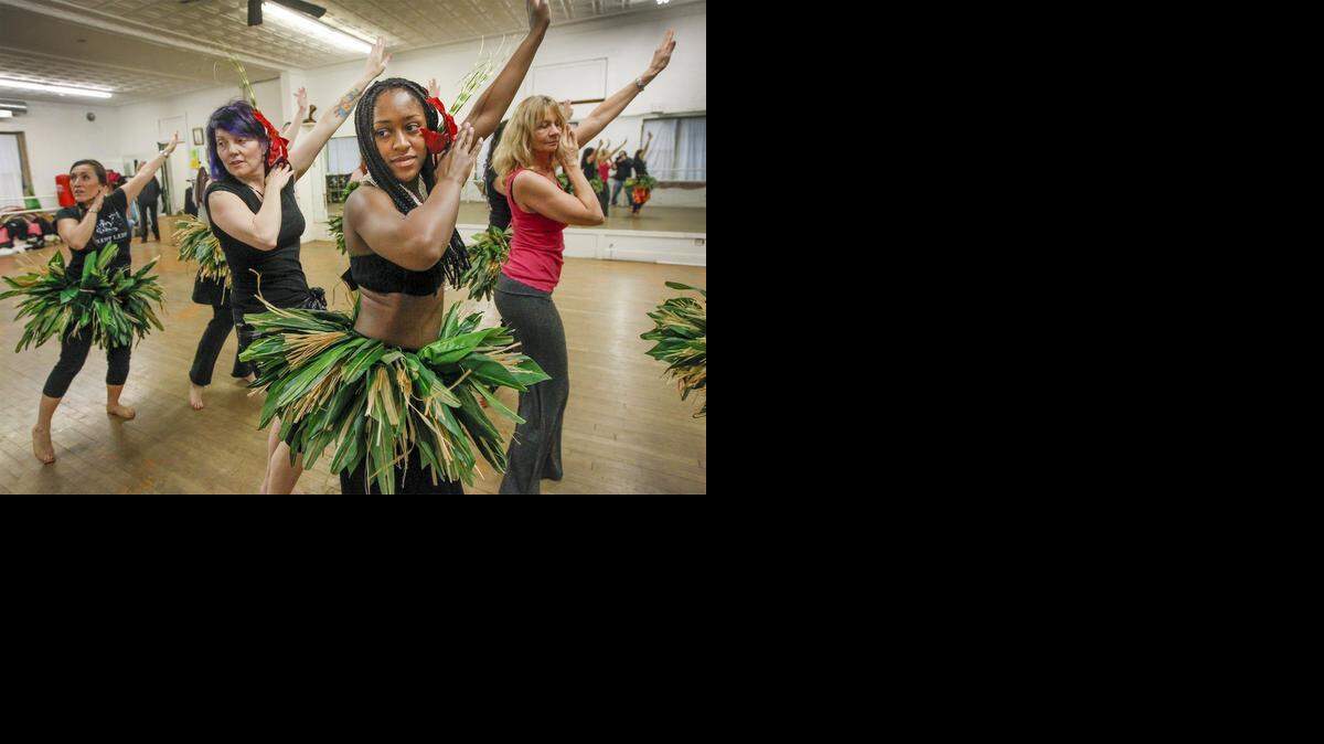 
Amira dancers Rosalyn Davis, left, Marta McKim, Jessica Bullock and Terri Sheridan rehearse a Polynesian dance number “Sea of Creation,” at Amira Dance Studios.
