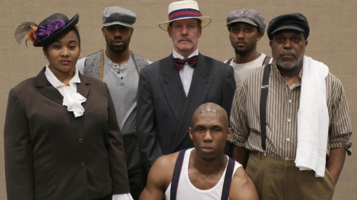 “The Royale,” an historic drama based on the life of boxer Jack Johnson, runs through Feb. 25. Cast members are from left: Anjelica Breathett, Daley Gunter, Mark Anderson, Deontae Hayden, Robert Barnes and Aaron Profit (seated).