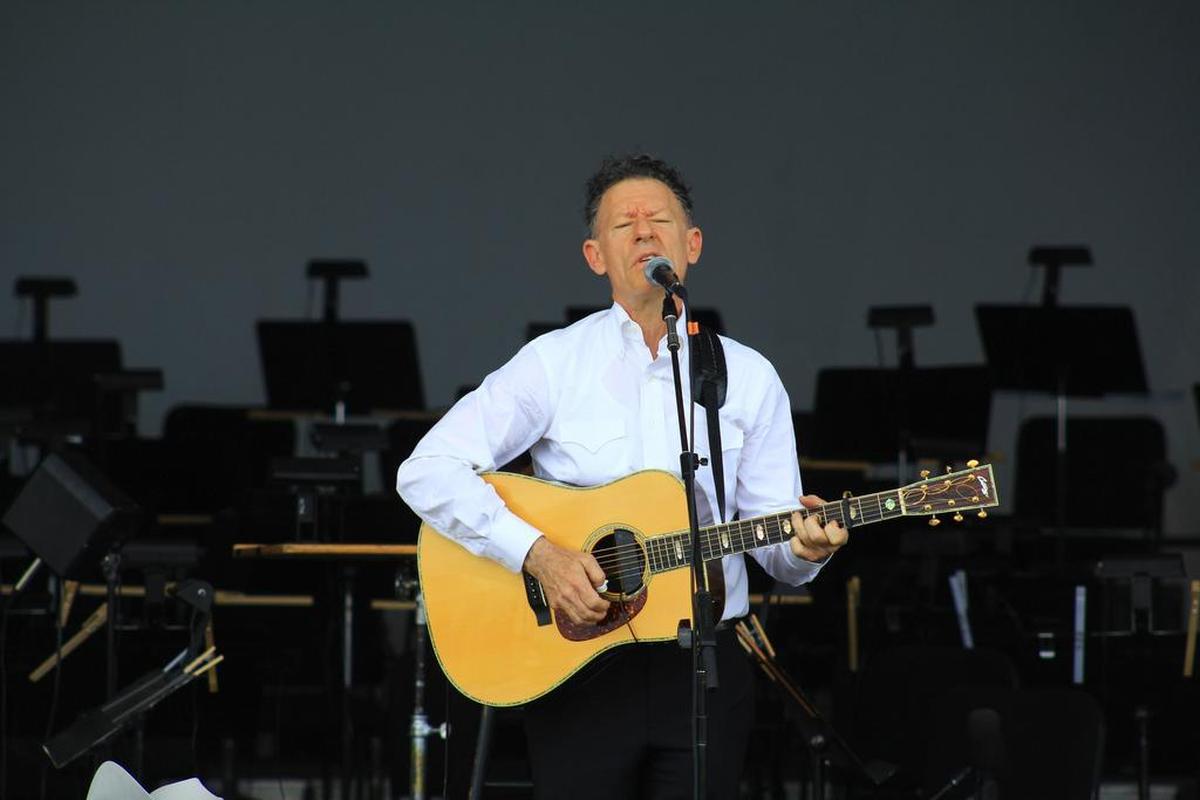 Grammy Award-winning musician Lyle Lovett warmed up with his band before the 10th annual Symphony in the Flint Hills in 2015.