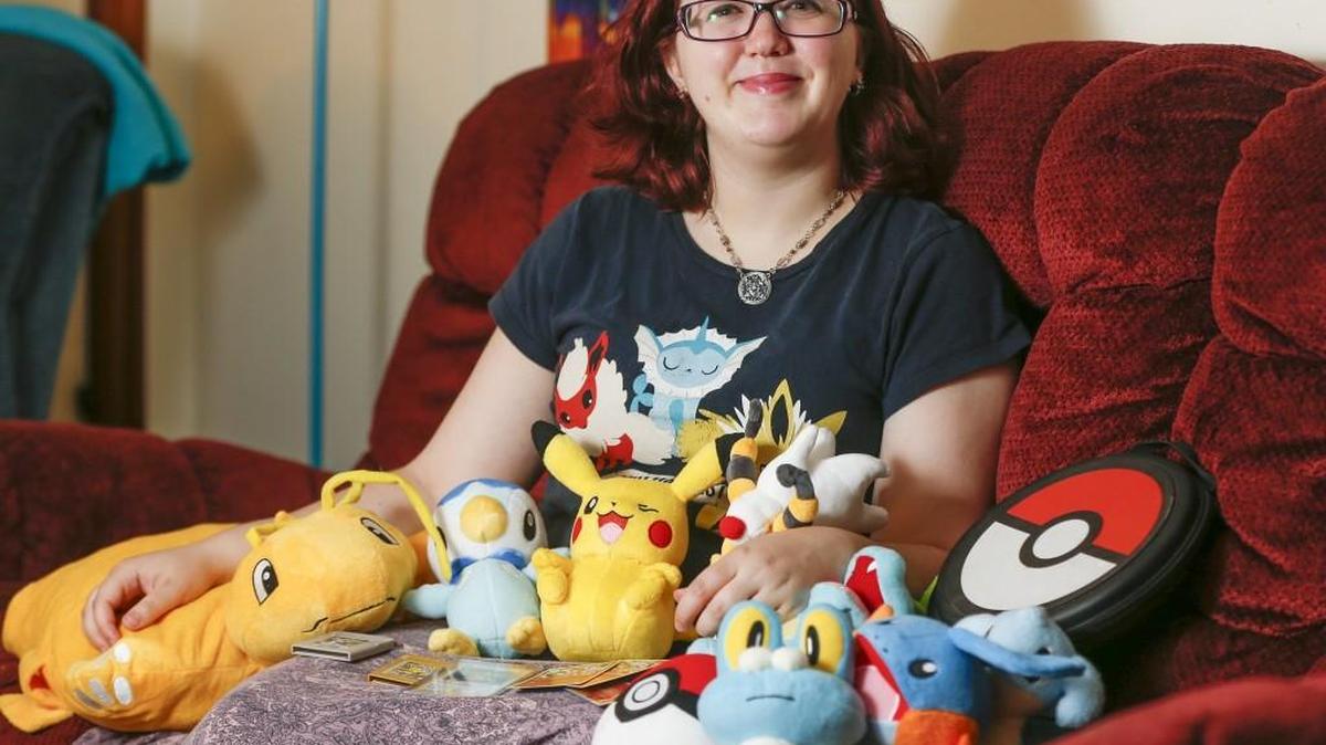 Rebekah Valentine, a local video-game writer, shows off some of her Pokemon collection at her home Tuesday. (May 17, 2016)