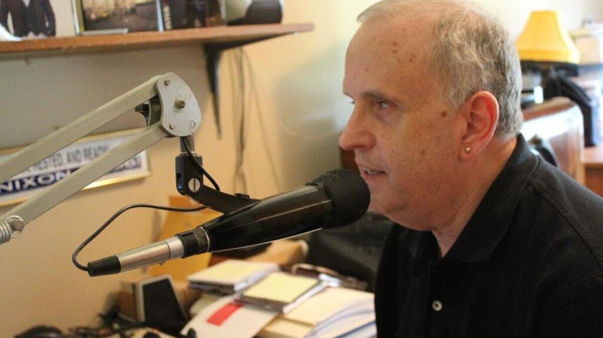 Steve Bauer records an opening for a future episode of the “Sunday Jazz Brunch” radio show.