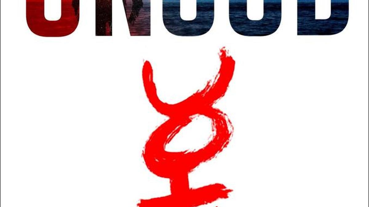 This cover image released by Dutton shows “UNSUB” by Meg Gardiner.