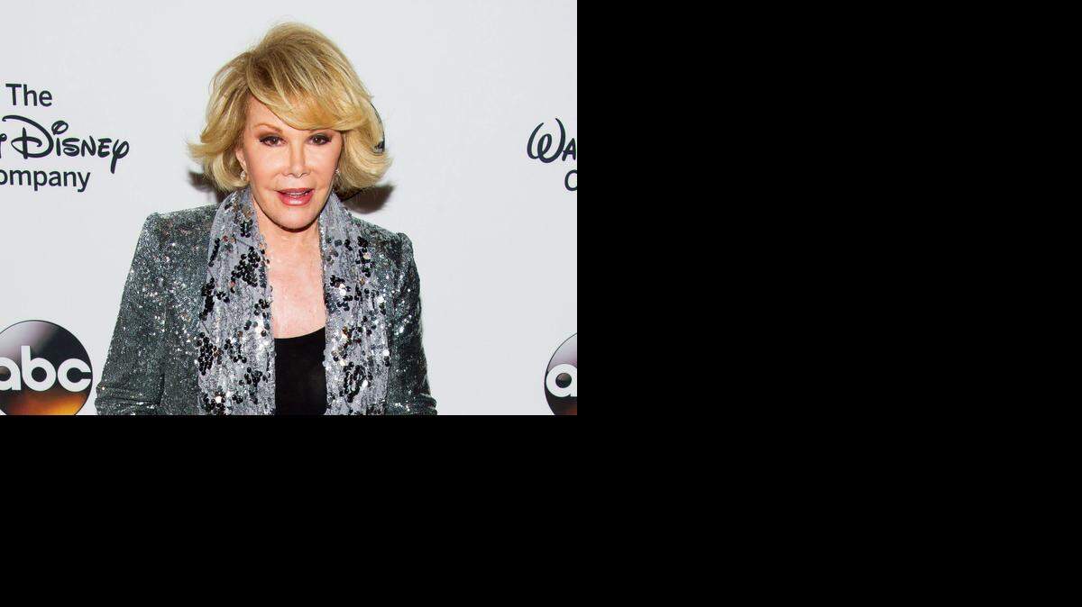 
Joan Rivers went into cardiac arrest during a throat procedure on Aug. 28 and died on Sept. 4.
