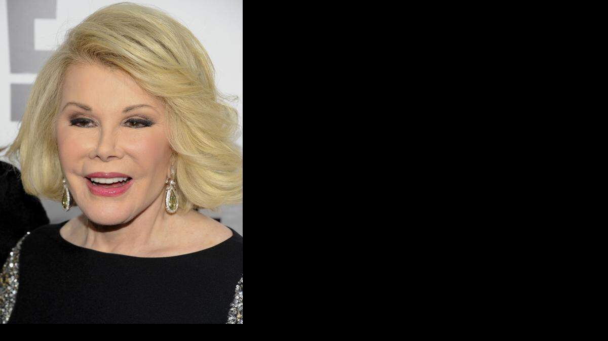 
In this April 30, 2012, file photo, Joan Rivers attends an E! Network event in New York. Joan Rivers’ family is confirmed Tuesday, Sept. 2, 2014, that the comic is on life support after going into cardiac arrest last week during a procedure at a doctor's office. Her daughter, Melissa Rivers, said in a statement Tuesday that her mother is on life support “at this time.” Melissa said the family is extremely grateful for the public support. 
