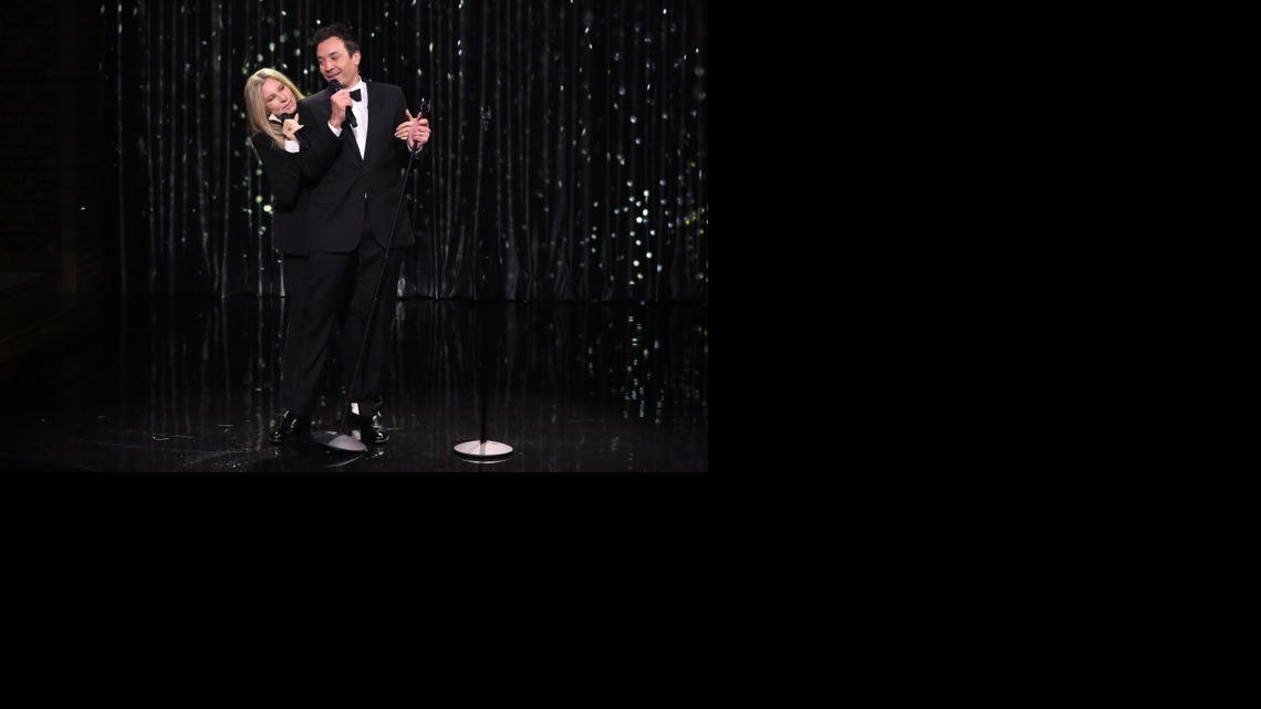 
In this image released by NBC, host Jimmy Fallon sings a medley of duets with Barbra Streisand during “The Tonight Show Starring Jimmy Fallon” on Monday in New York. Streisand is promoting her new album, “Partners,” a collection duets. (Sept. 15, 2014)

