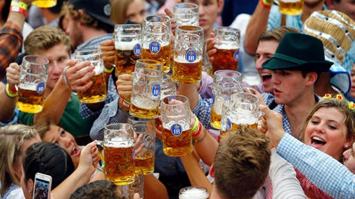 People celebrate the opening of the Oktoberfest beer festival in Munich, southern Germany in 2015.