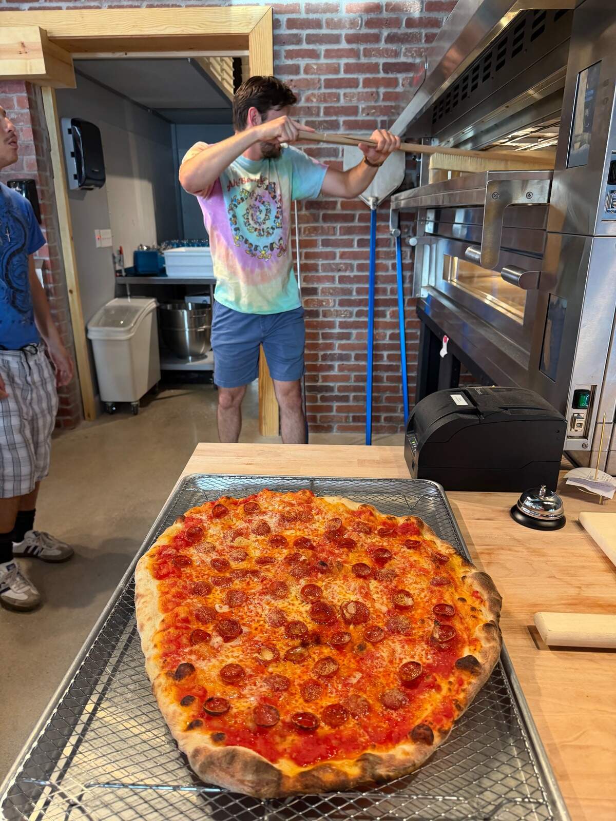 The pies at Tommy’s Apizza are made in deck ovens that help produce a New Haven-style crust.