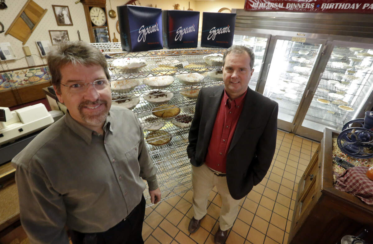 Spear’s owner Dan Crandall, left, is pictured with Randy Spear in 2014. Spear sold his family’s restaurant to Crandall, a longtime manager, that year.
