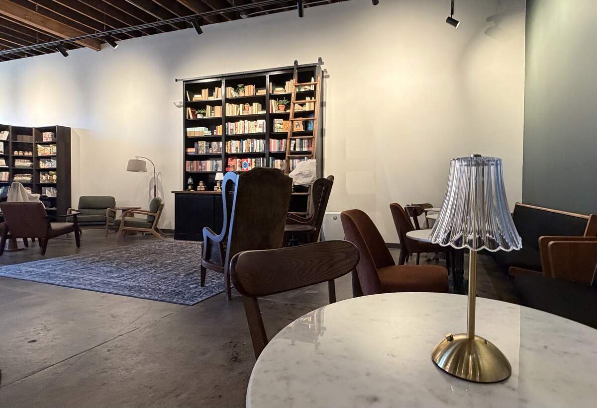 The back section of Final Draft bookstore has lots of seating areas plus a coffee and cocktail bar.