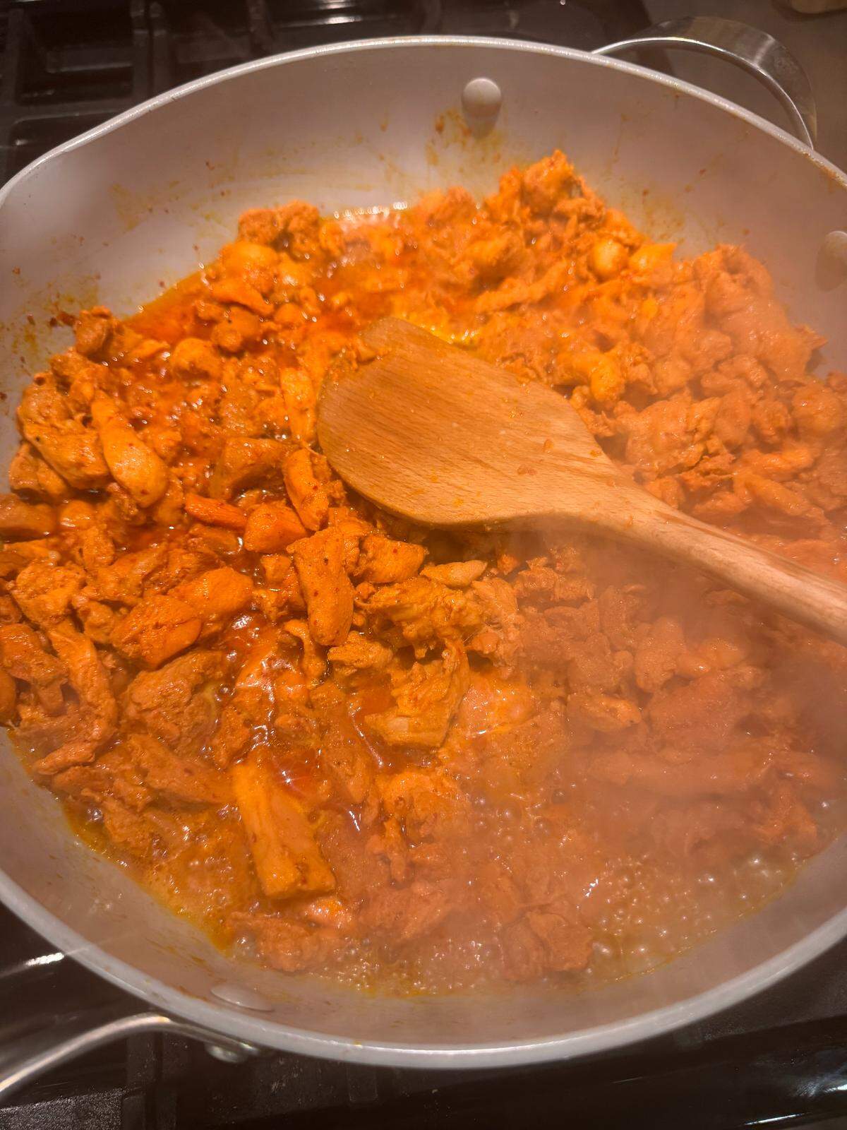I cooked three pounds of marinated fajita chicken in a big skillet for about 20 minutes.