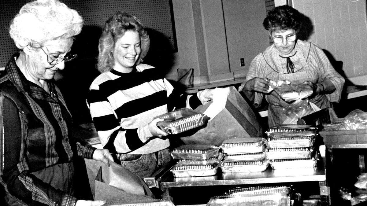 The St. George Lebanese Dinner has been a tradition in Wichita since 1921. This photo shows a group of women preparing meals in 1988.