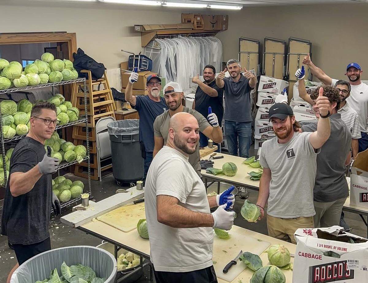 Church volunteers work to prepare cabbage for cabbage rolls that will be served at the St. George Lebanese Dinner.