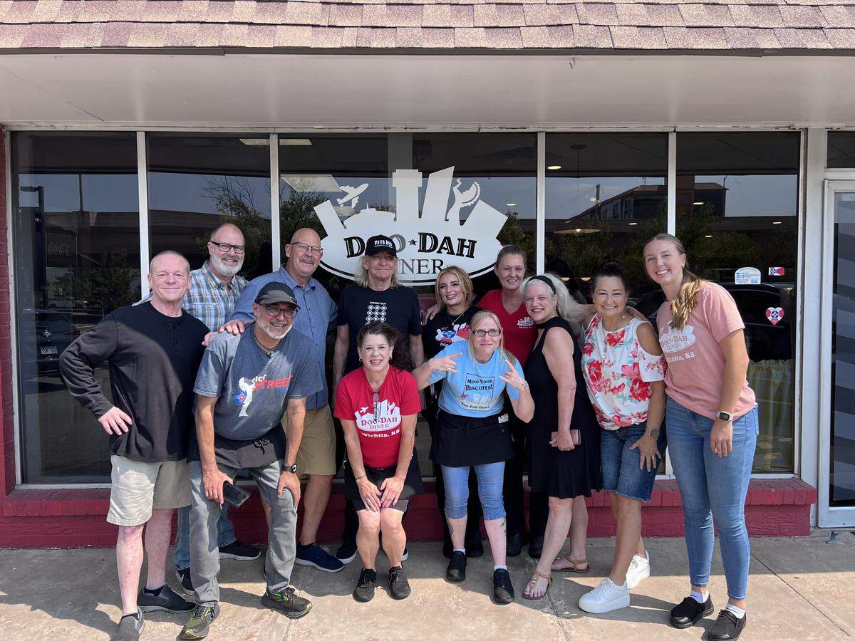 Joe Walsh, back row in black shirt, is pictured with the staff of Doo-Dah Diner in August 2025.
