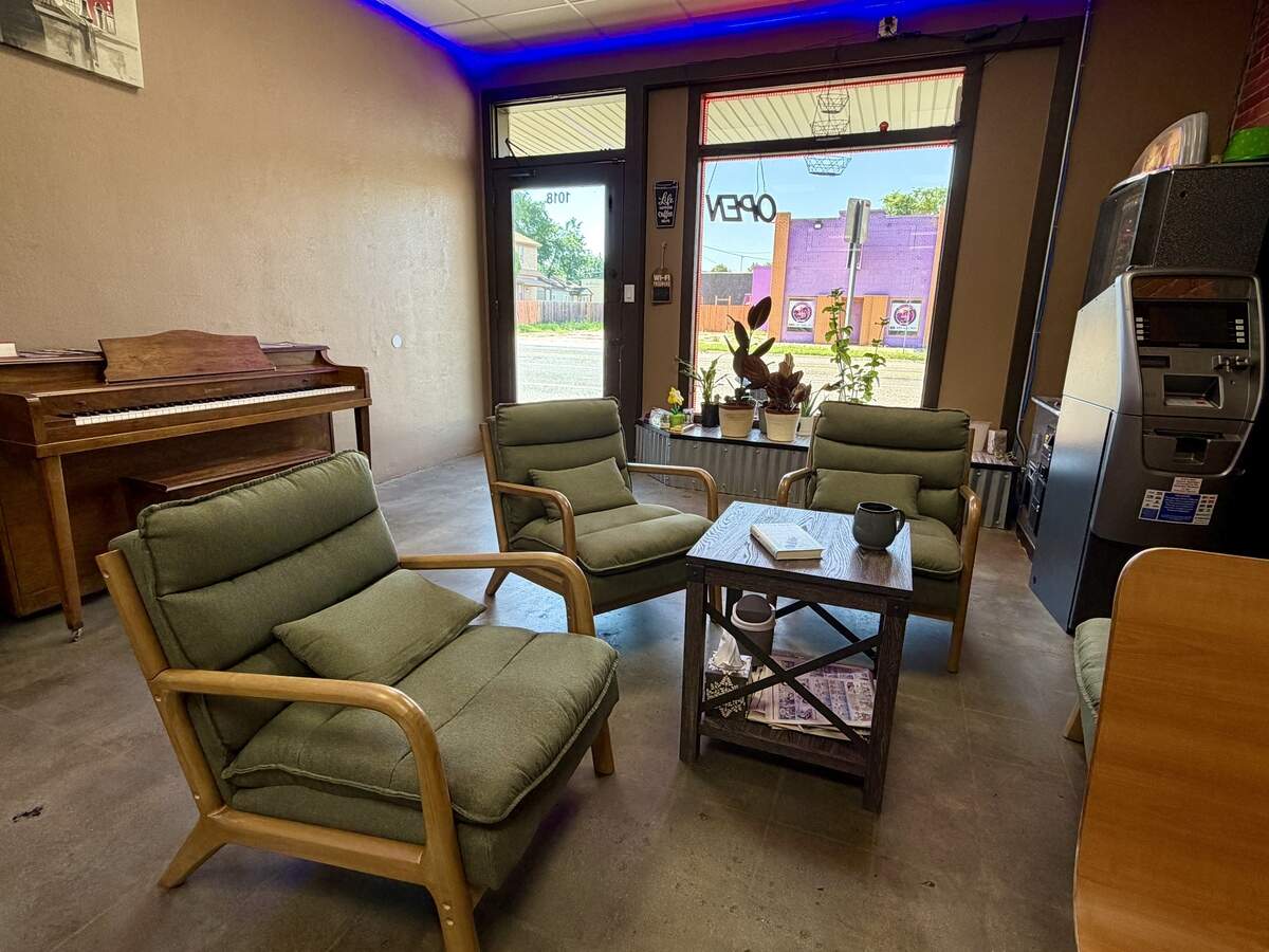The dining room at Night Owl Cafe has a couple of booths, some high-top tables and a conversation area. It even has a piano.