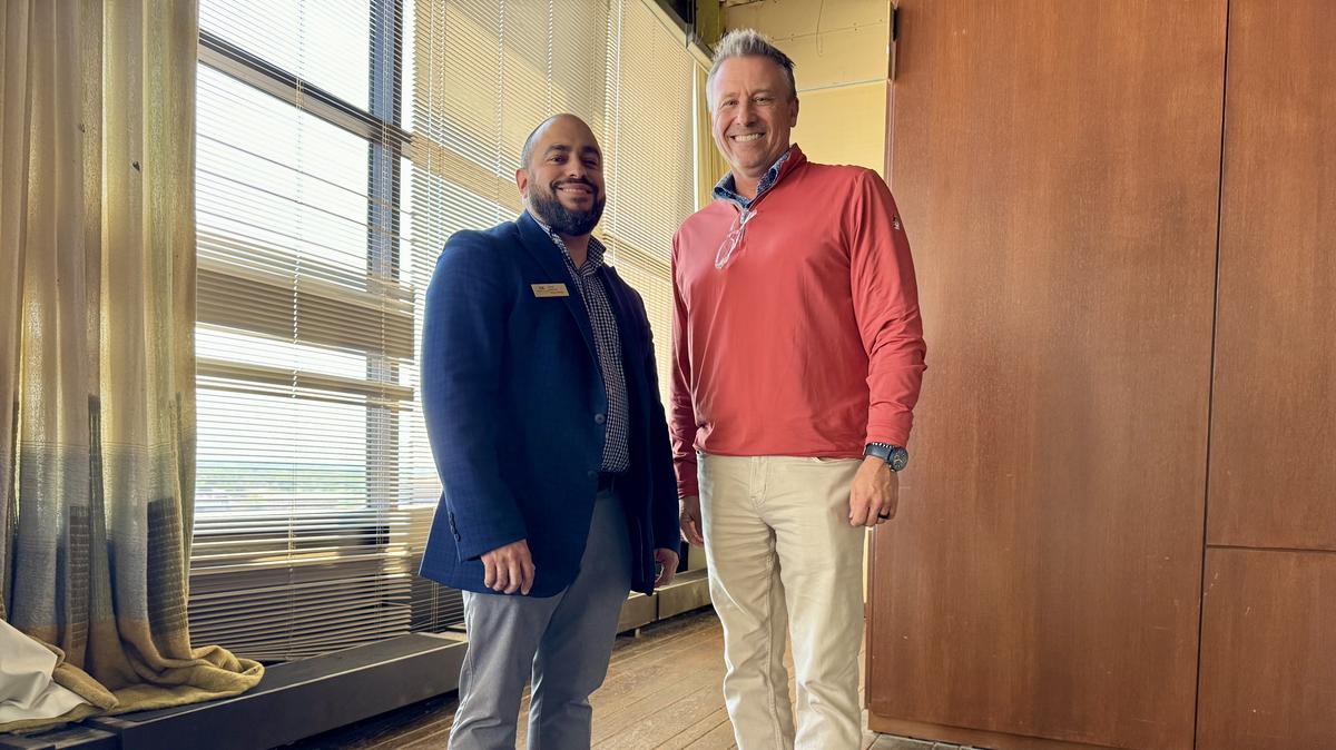 Ninth Floor Club co-owner Scott Welsh, left, and club general manager Chris Romero are pictured in the future home of the Cloud 9 cigar bar, which will be a new perk for Ninth Floor club members.