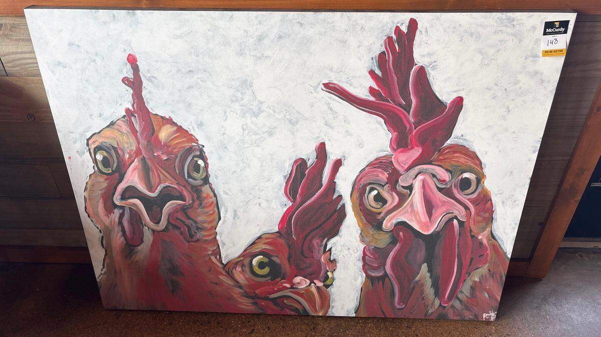 What can a regular person buy at a restaurant auction? Those who bid on the liquidation auction of the former Chick N Max restaurant on West Central have a chance to pick up this chicken painting by a local artist.