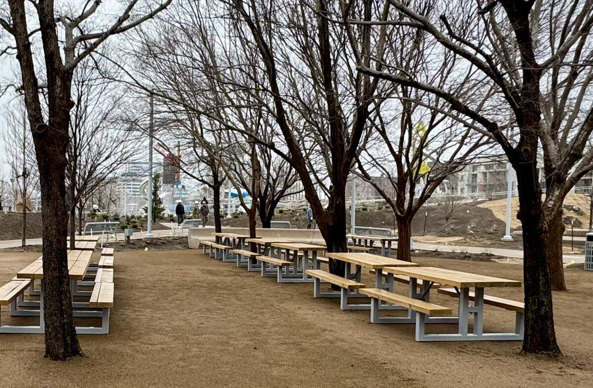 People who dine at Graze, the new concession service at Exploration Place’s Adventure Playscape, can sit at nearby picnic tables.