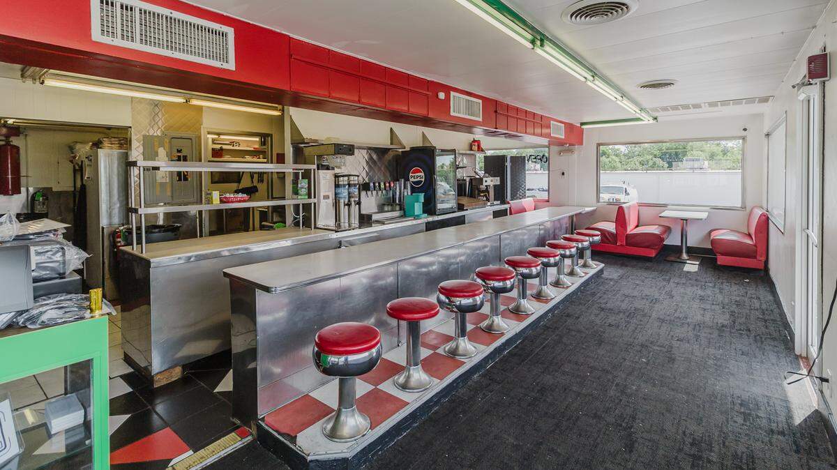 The inside of the Brint’s Diner building, which is going up for auction next week