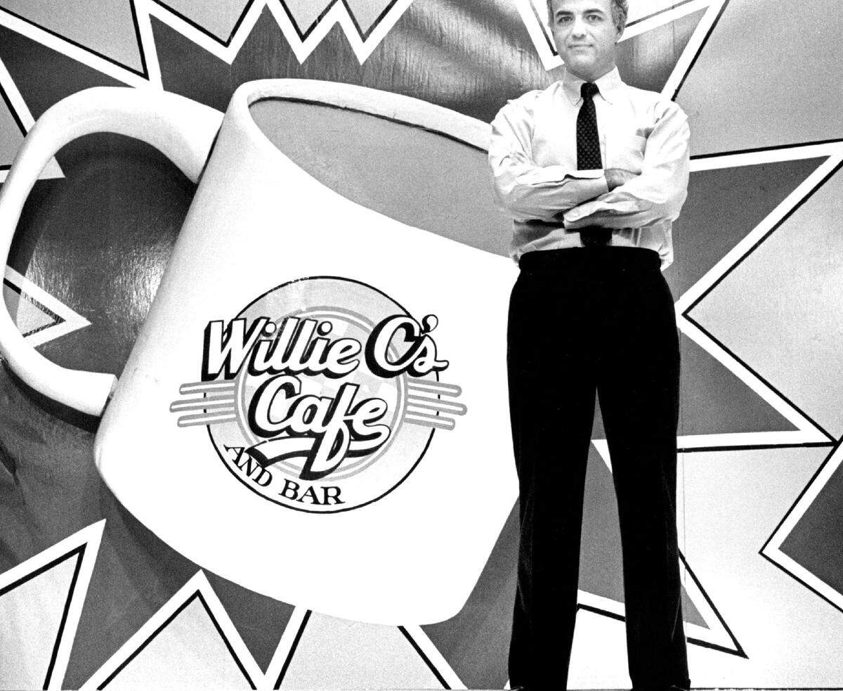 Bill Rowe, principal owner of Willie C's in his restaurant.