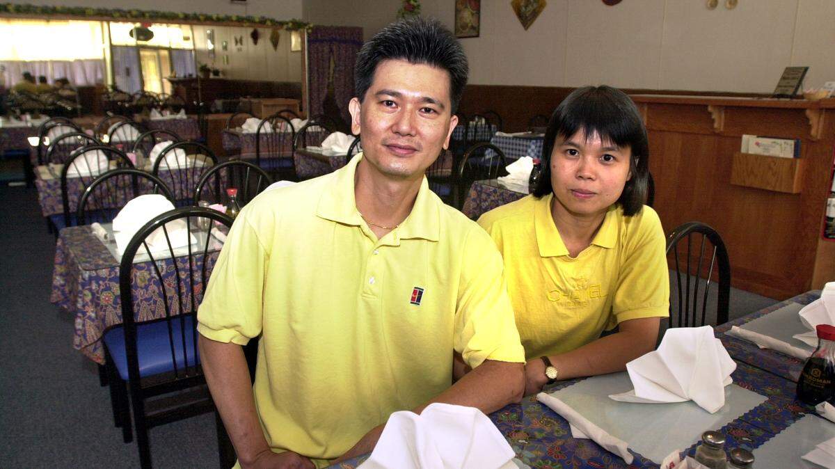 Yook Gan, right, is pictured in 2001 at her former restaurant, Cafe Asia, with her husband Mike Gan, left. 