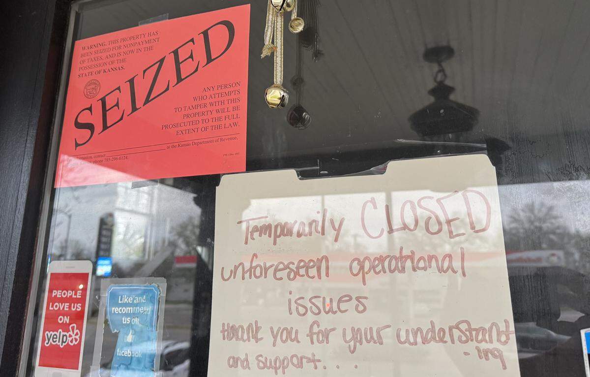 A sign was posted Tuesday morning on the door of The Coop, a coffee shop at 2812 E. Douglas in Wichita, indicating that the property had been seized for nonpayment of taxes. The shop has been closed for weeks.
