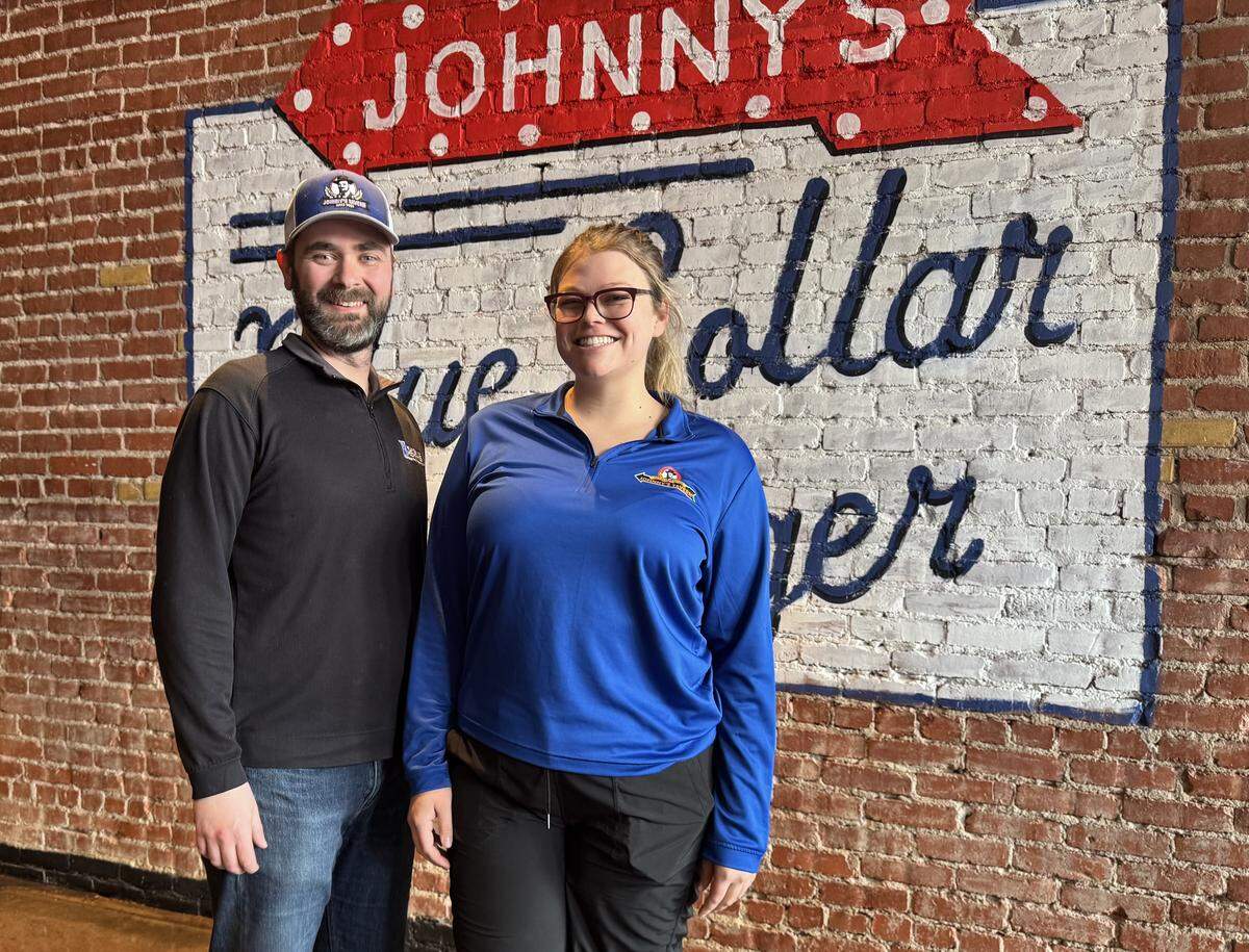 The management team on the at Wichita’s Johnny’s Tavern is made up of general manager Caroline Patton, right, and assistant general manager Tyler Vernon, left. 