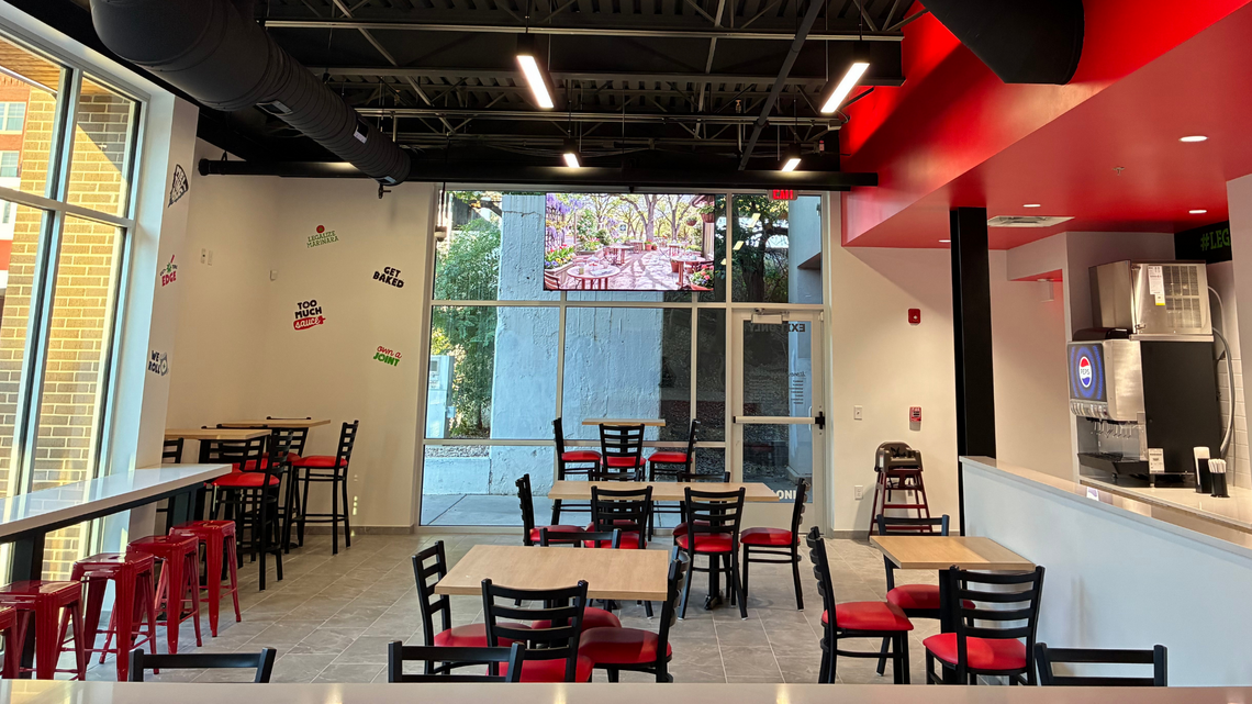 A new pizza chain that opened in Wichita this week has double entendre to spare