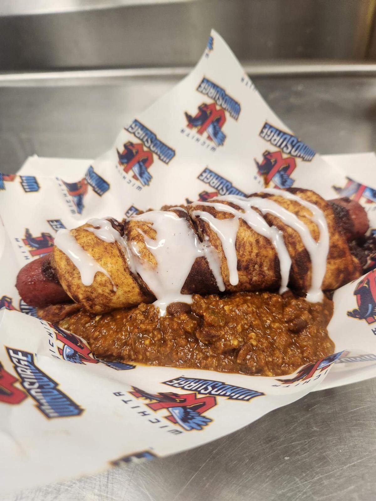 The “Cinna-Dog” is a new hot dog that will be offered at this year’s home Wichita Wind Surge games at Equity Bank Park. It features a hot dog wrapped in a cinnamon roll and served atop a serving of chili.