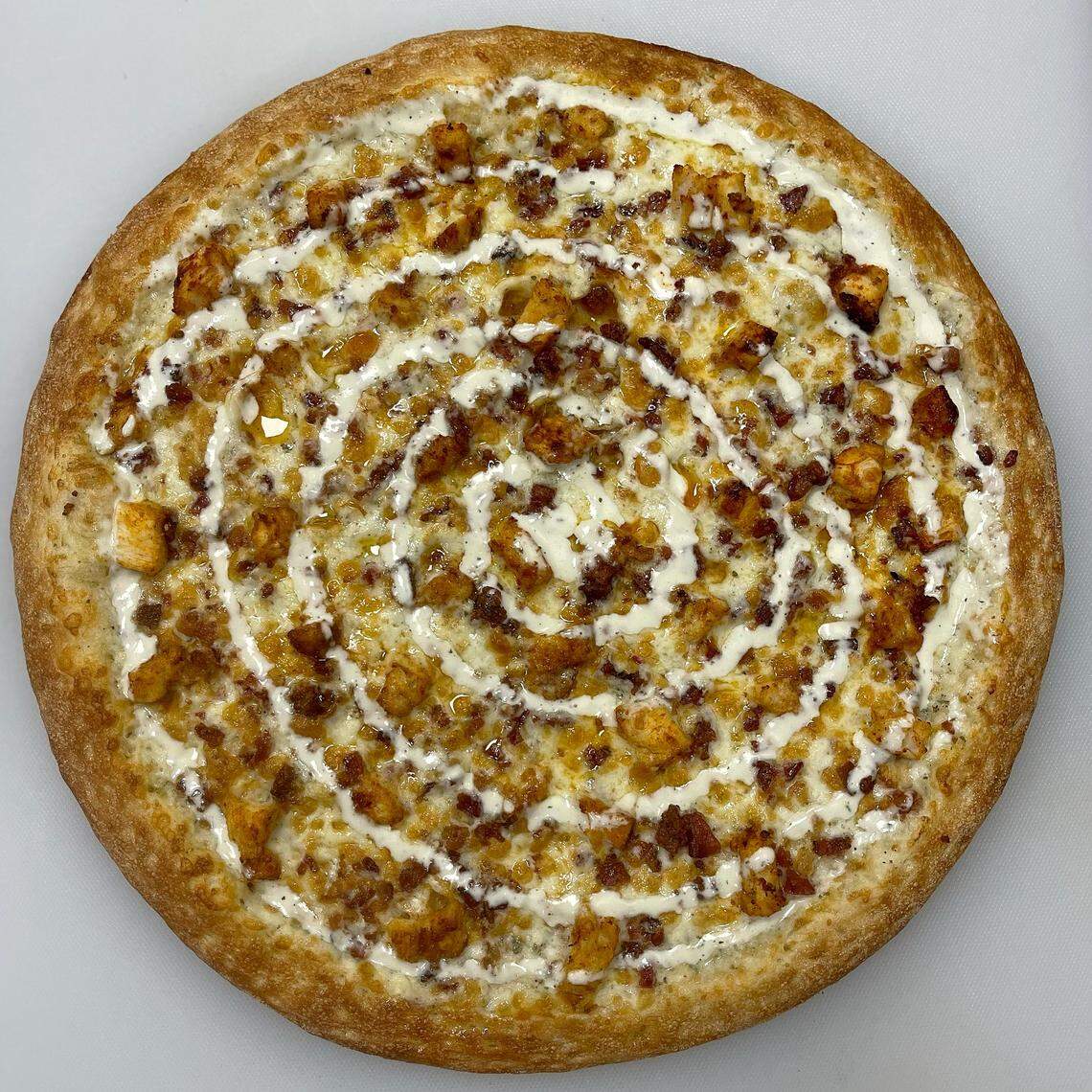 Stoner’s Pizza Joint serves pizzas, stromboli, smoked wings, salads and desserts.