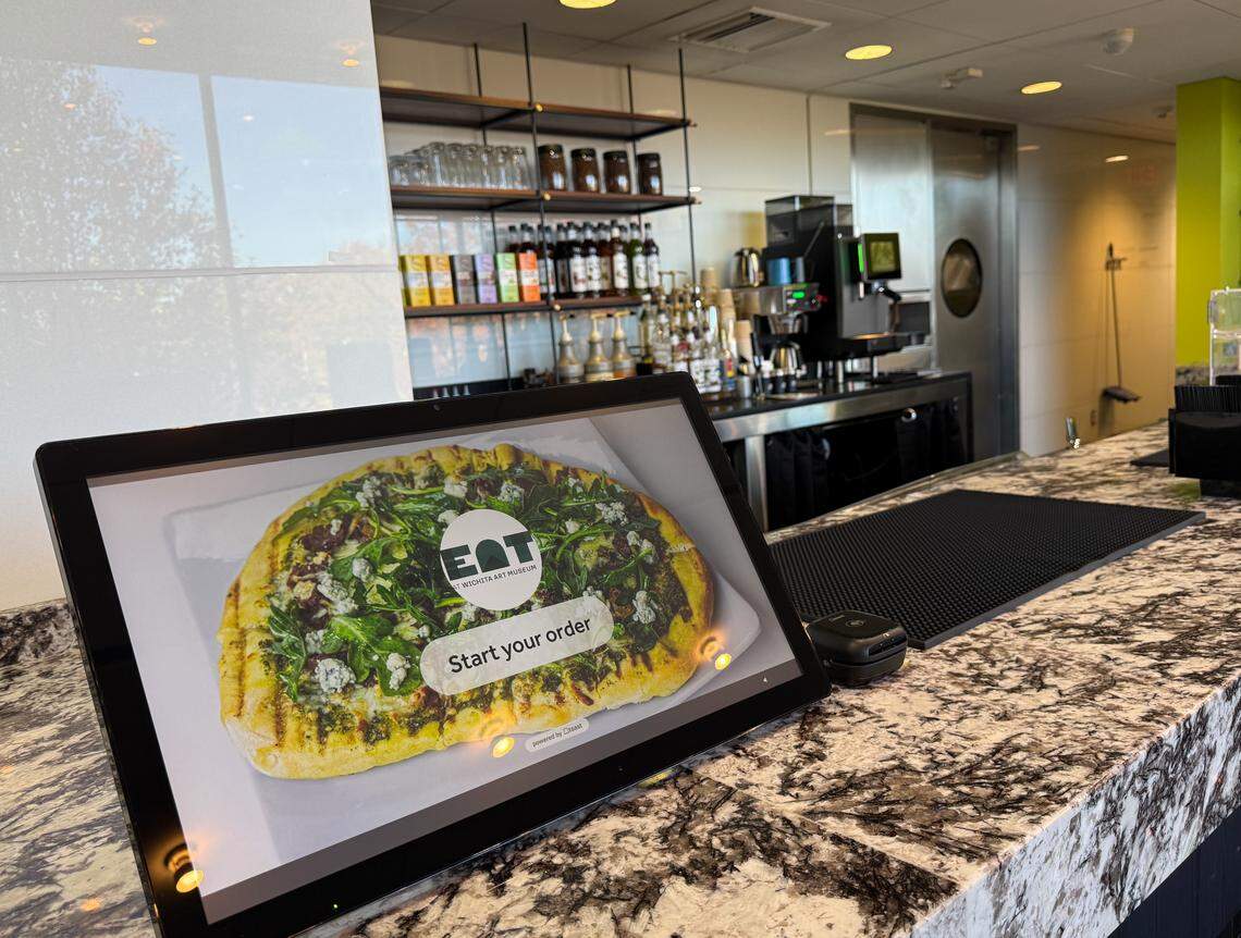 A sign for the new Eat at the Wichita Art Museum greets diners.