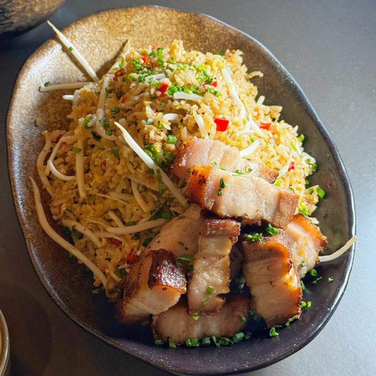 Wichita Festivals Inc. President and CEO BreAnna Monk said that Lima Nation Peruvian Kitchen’s arroz chaufa with crispy pork belly was her favorite meal of 2025.