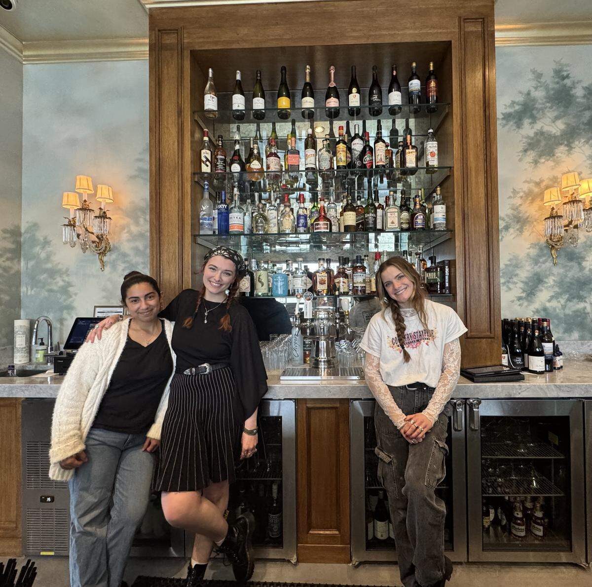 Among the staff at the new Goldfinch Coffee and Cocktails are, left to right, Aaliyah Collazo, Shannon Lee and Malia Flores.