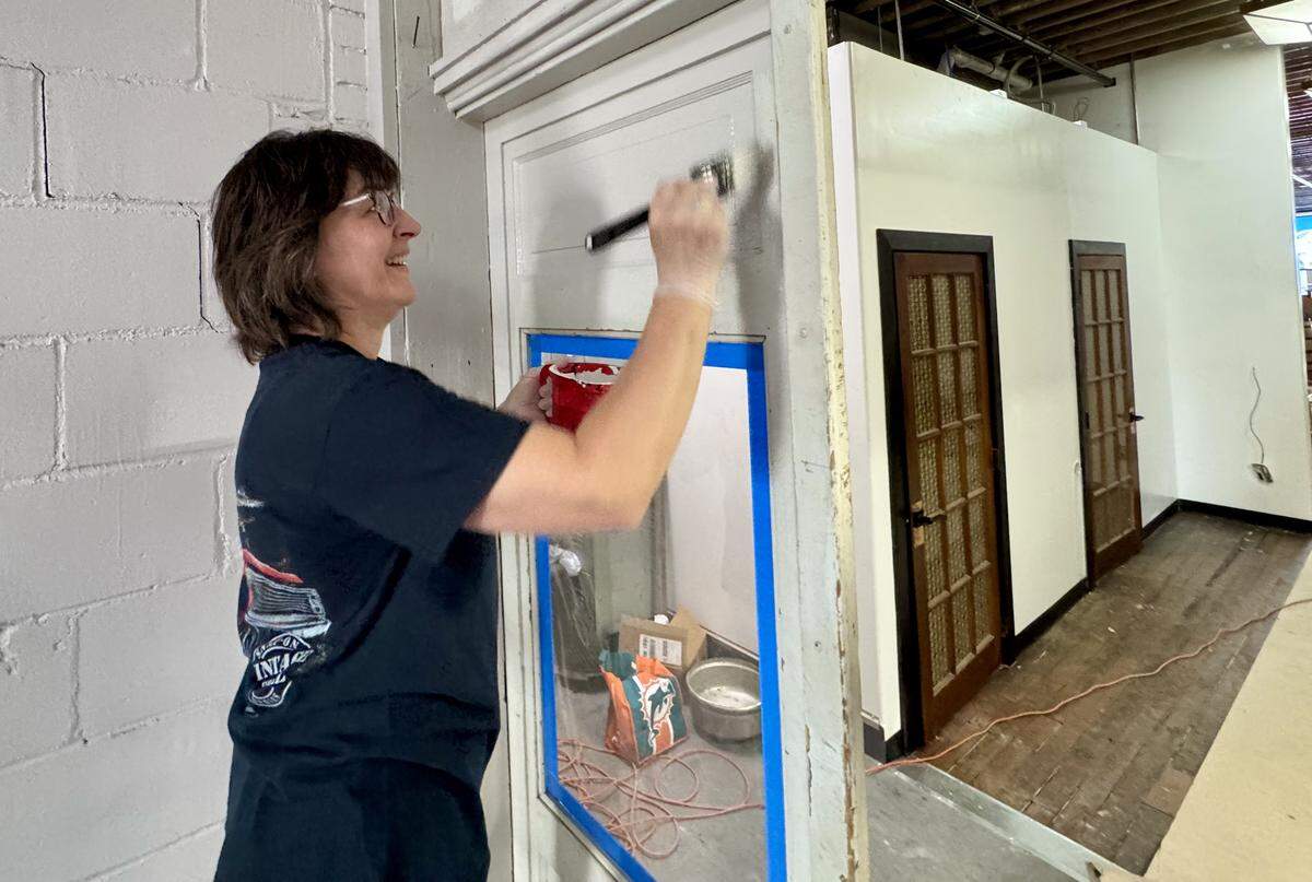 Manu English, owner of Prost, was at the new space on St. Francis over the weekend painting the door to the kitchen.