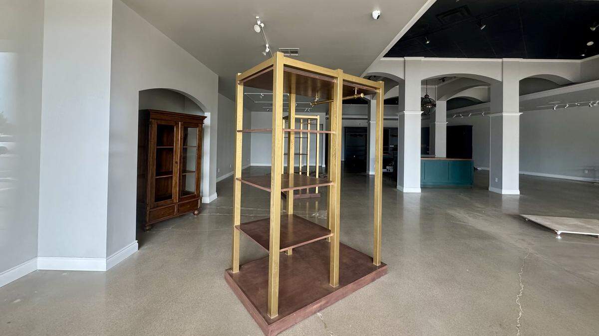 The space that had been home to men’s clothing store W 1857 is now empty, and its racks are bare.