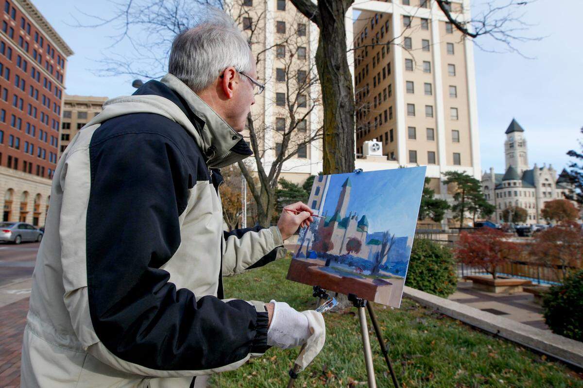 A Wichita Eagle photographer found Bill Goffrier painting a picture of the Wichita-Sedgwick County Historical Museum in 2014.